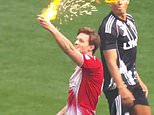 Bizarre moment YouTube star sets FIRE to yellow card in Sidemen charity match at Wembley – after being booked by ex-Premier League referee