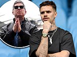 Romeo Beckham jokes he’s ‘behind enemy lines’ while attending Man City vs Arsenal clash – as Noel Gallagher also joins crowds at the Etihad Stadium