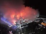 Moment blazing inferno rips through roof of LGBT+ nightclub – as man, 51, is arrested on suspicion of arson