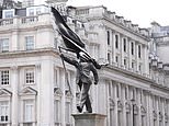 Is this London’s latest Banksy? Mystery statue of man blinded by flag sparks speculation