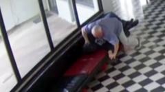 Moment gunman tackled by school principal