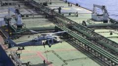 US boards ship carrying Iran oil as Trump threatens mine-laying vessels