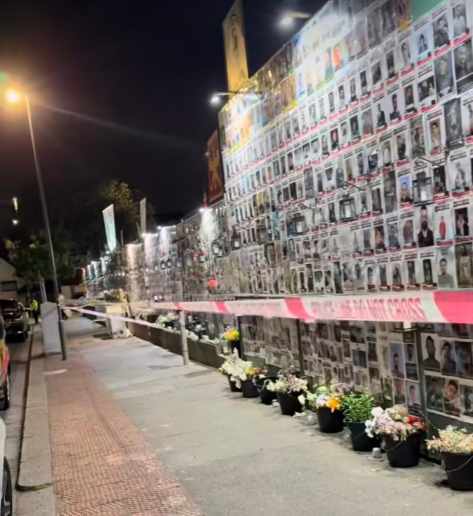 Police investigate suspected arson attack at memorial wall in north London