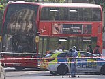 Street shooting puts four people in hospital with one victim fighting for life after gunmen fire from Brixton car