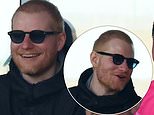 Ed Sheeran cheers on his beloved Ipswich FC as they get promoted back to the Premier League – after shaving his head following health battle