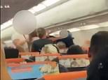 Shocking moment drunken brawl breaks out on easyJet flight as ‘woman swigs vodka and spits in passenger’s face’