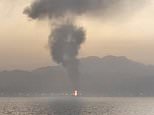 Trump confirms Iranian attacks on ships in Strait of Hormuz as Tehran launches drone and missile attacks on UAE – live updates 
