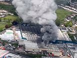 Fire breaks out at Warburtons bread factory with smoke billowing into the sky as TV star Bank of Dave ‘offers to rescue people’ in his helicopter
