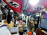 Former soldier who kept 600 weapons including grenades, landmines and rifles in Nazi-themed ‘man cave’ is jailed