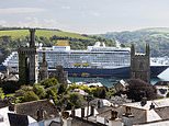 ‘What a horrible sight despoiling both land and sea!’: Cornish residents are in uproar as 58,000-ton cruise ship that can carry 1,500 docks in their picturesque town (population 2,240)