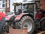 Stolen tractor smashes into house at full throttle before masked gang flee in getaway car and neighbours are evacuated