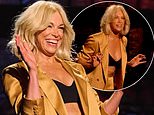 Hannah Waddingham, 51, flashes her bra in a mustard yellow suit as she delights fans with SNL UK hosting debut
