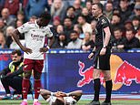 Arsenal and England suffer major injury scare as Gunners star is forced off against West Ham after collision