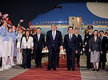 Trump smiles and fist pumps as he’s greeted by 300 chanting Chinese kids waving American flags as he prepares to meet Xi amid Iran tensions