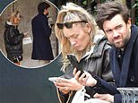 Newlyweds Jack Whitehall and Roxy Horner look engrossed by their phones as they minimoon in Venice after their £250,000 wedding