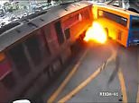 Train driver is charged after eight people were killed and 32 injured when locomotive ploughed into bus in Thailand during rush hour – sparking inferno