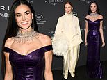 Demi Moore continues her Cannes fashion parade in a purple leather dress and extravagant diamond necklace as she joins Julianne Moore at the Kering Women In Motion Awards