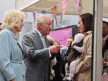 King and Queen dance, play the drums and drink whiskey in Belfast as they arrive in Northern Ireland amid party atmosphere