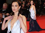Alexa Chung steals the spotlight from boyfriend Tom Sturridge in daring satin and lace dress at the star-studded Cannes premiere of his new movie The Man I Love