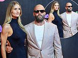 Rosie Huntington-Whiteley, 39, wows in a skin-tight dress as she joins Jason Statham, 58, for a rare red carpet appearance at 7 Dogs premiere in Egypt