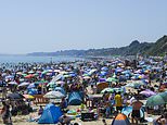 Man dies on packed beach on hottest bank holiday ever: Thousands ignore official government advice to stay out of sun in ‘historic’ 35C heatwave amid warnings of ‘super El Nino’ summer