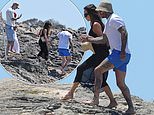 Victoria Beckham shows her commitment to fashion as she teeters in heels on rocky terrain while son Romeo films her in scenes reminiscent of pal Lauren Sanchez