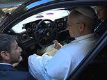 The fastest Pope-mobile ever? Pontiff gets behind the wheel of Ferrari’s new Luce electric supercar
