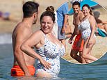 Swimsuit-clad Kelly Brook and her shirtless husband Jeremy Parisi hit the beach during St Tropez holiday
