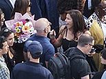 Lauren Sanchez Bezos flashes trademark grin while clinging to husband Jeff at her daughter’s graduation… just hours before Blue Origin rocket exploded in huge fireball