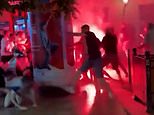 Arsenal fans clash with Paris St Germain gangs in Budapest and police arrest two British supporters ahead of Champions League Final