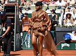 Naomi Osaka arrives for French Open match in billowing dress as she refuses to back down AGAIN on wearing ‘fashion show’ outfits, despite infuriating opponent