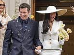 Dua Lipa and Callum Turner are married! Singer dazzles in a white skirt suit for London legal ceremony ahead of their three-day Italian extravaganza