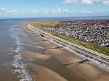 Woman dies and man is left fighting for his life after they got into difficulty in the sea ‘while trying to rescue pet dog’