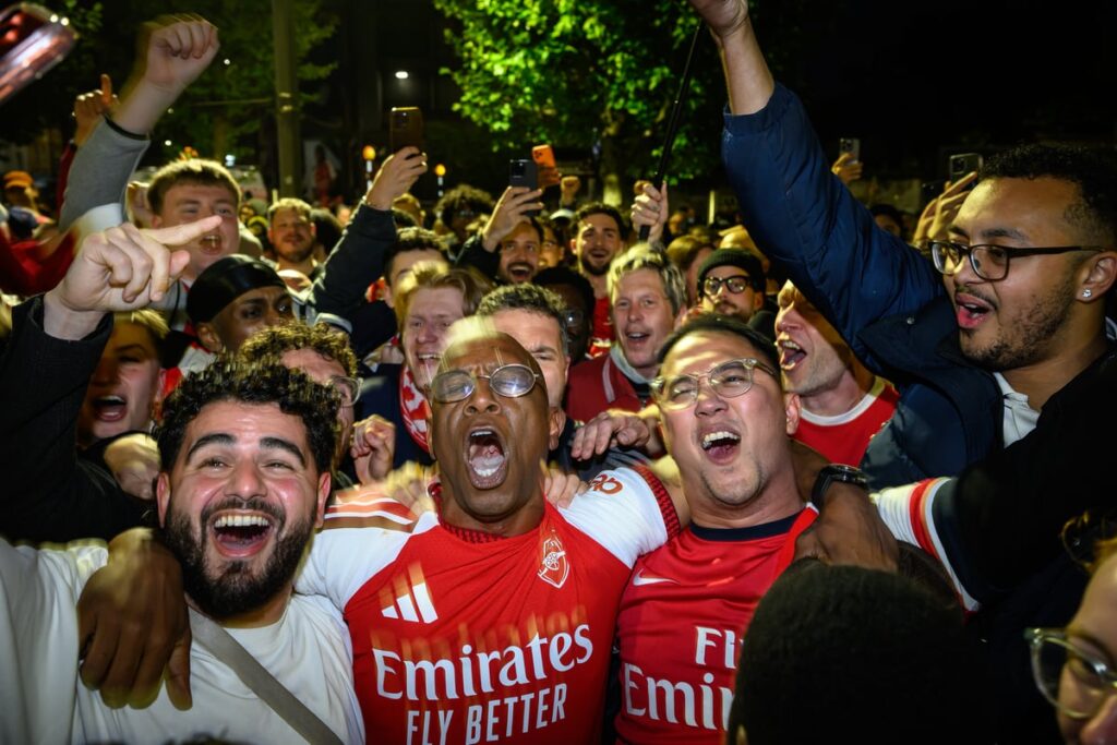 Watch: Ian Wright leads Arsenal celebrations outside Emirates Stadium after title triumph