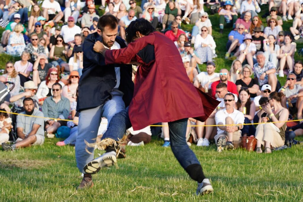 Straw flies as shin-kicking champion crowned at ancient rural games