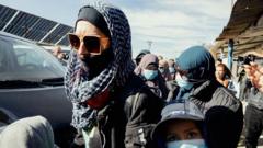 IS families in Syria have booked tickets home to Australia, minister says