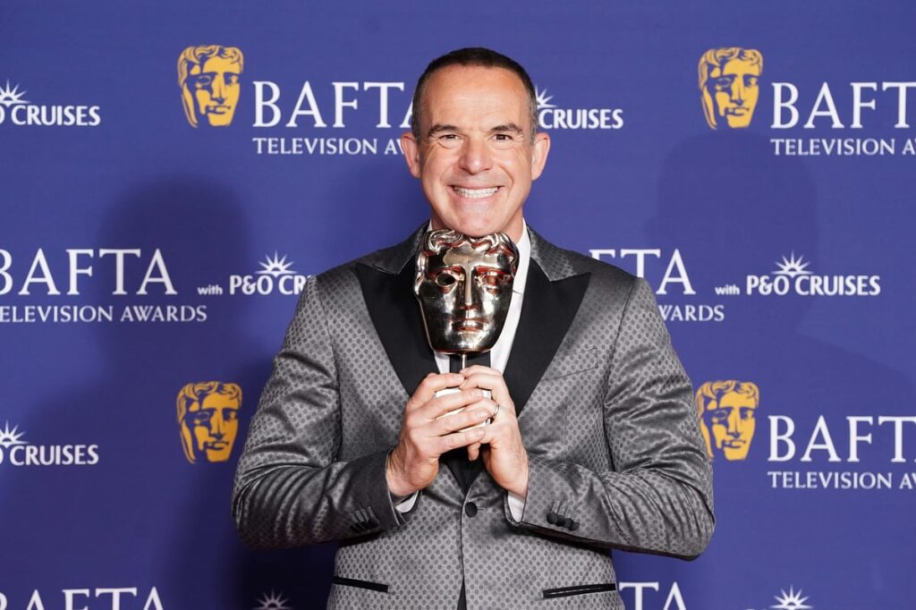 Martin Lewis reflects on ‘broken’ childhood while picking up Bafta special award