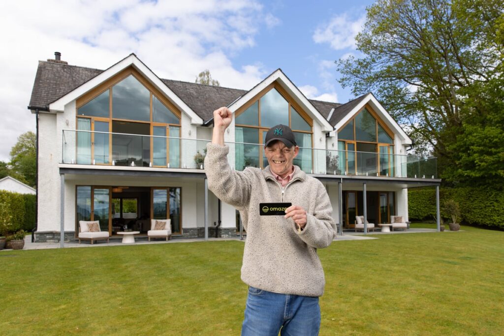 Londoner who’s lived in same council flat for 42 years wins £5million Omaze mansion