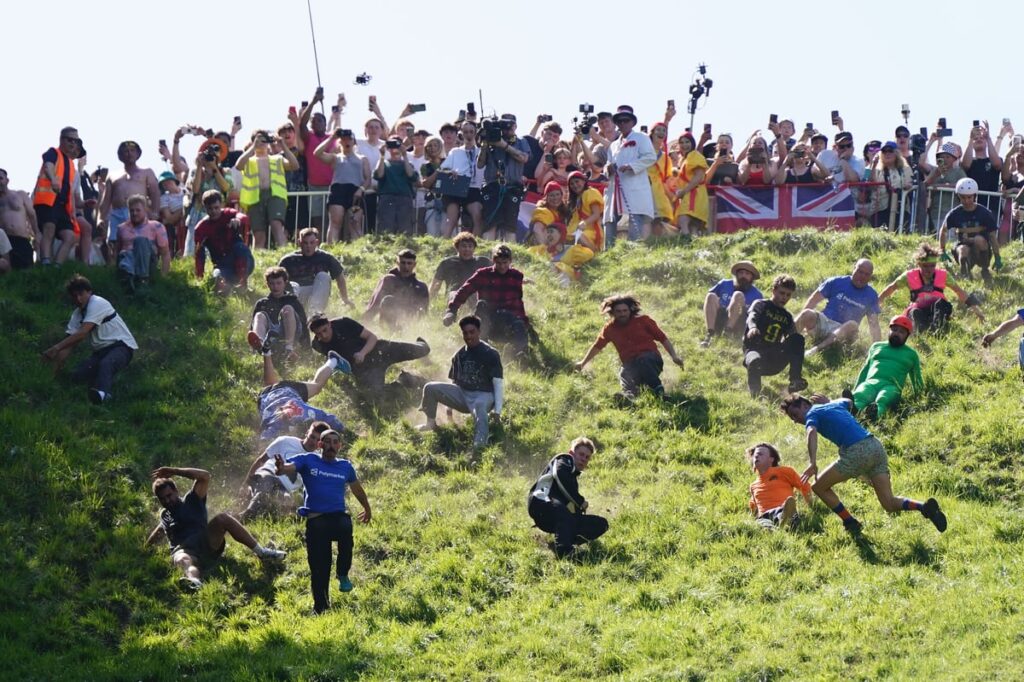 German YouTuber pips local man to win Gloucestershire cheese-rolling contest