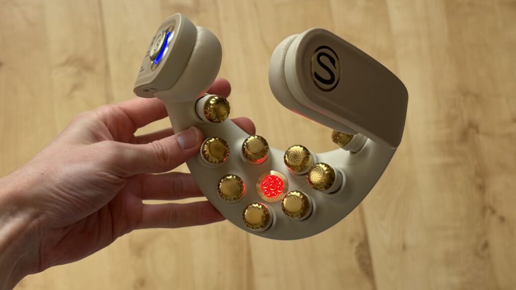 This foldable, futuristic neck massager will heat your aching muscles and talk to you while it does so — yes, really