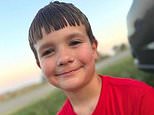 ‘Bravest little boy in America,’ 8, dies trying to save his mother’s life in selfless act that has broken small town’s heart
