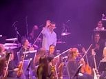 Audience member steps up and pulls off incredible performance when pianist falls ill during La La Land live music show
