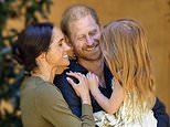 Like mother, like daughter! Lilibet, 5, follows in Meghan’s footsteps as she wears gold bangle similar to Duchess’ favourite Cartier style in new birthday portrait
