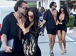 Yazmin Oukhellou shares kisses with a close friend as she enjoys a night of partying on Spanish holiday… four years after the tragic death of boyfriend Jake McLean