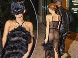 Naughty kitty! Kanye’s wife Bianca Censori is bra and underwear free in a VERY sheer gown with a CAT mask