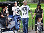Kourtney Kardashian stuns in sheer outfit as she cuddles son Rocky, two, during Central Park ride with Travis Barker