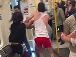 Moment three men brawl on Tube train in front of shocked commuters before it spills onto platform at West London station