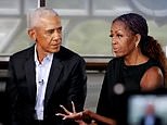 Body language expert reveals cryptic clues between Michelle and Barack Obama amid reports marriage is on the rocks