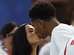 England’s Harry Kane, Jordan Pickford and Jude Bellingham share celebratory smooches with their WAGs in the stands after thrilling World Cup win against Croatia