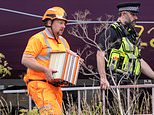Rail investigators remove black box from wreckage of Bedford train crash that killed driver and injured 100